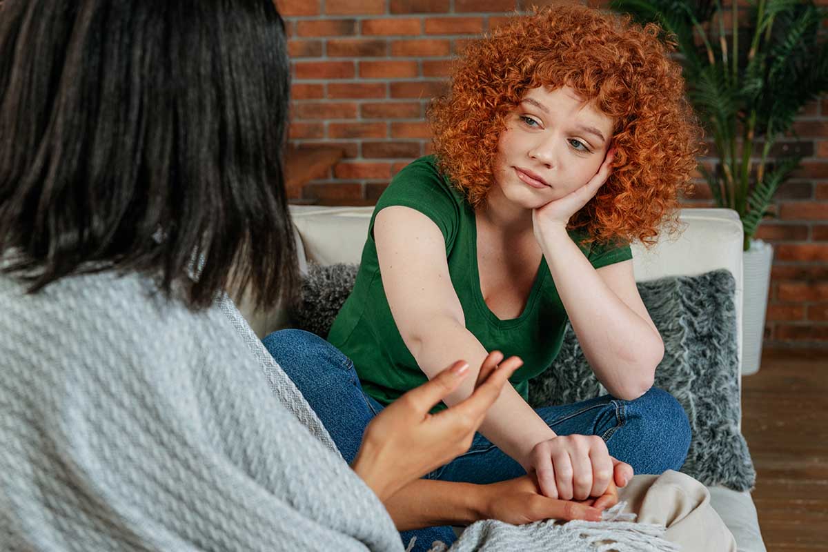 Friends sitting down and talking about the mental health crisis in America